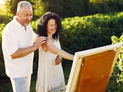 beautiful-adult-couple-drawing-in-a-summer-field-2023-11-27-05-02-23-utc-scaled-e1731406079611